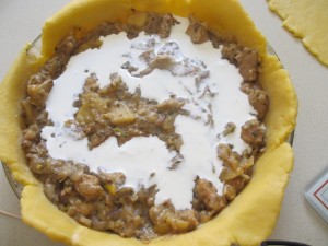 pork and apple filling topped with cream